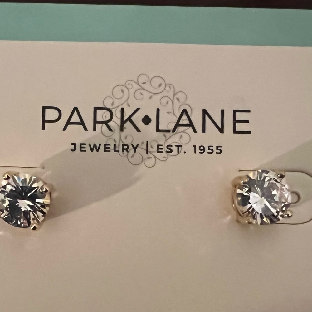 Park Lane clear impression studs set in gold